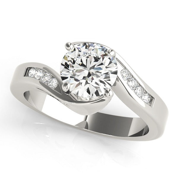 A bypass engagement ring with a central diamond surrounded by smaller diamonds on the band, set in white gold.