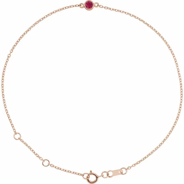 Rose gold bracelet with a red ruby